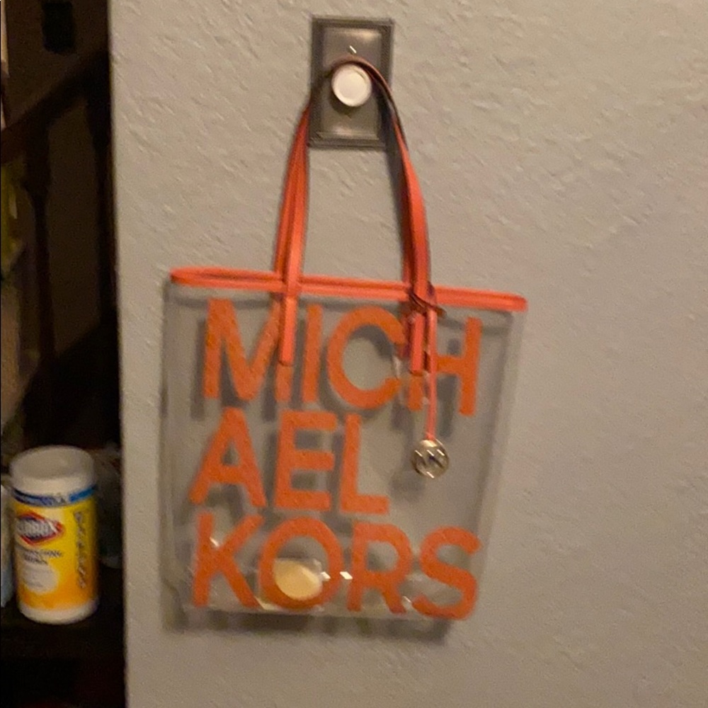 MICHAEL BAG’ SHOPPER TOTE color is more of a CORAL
